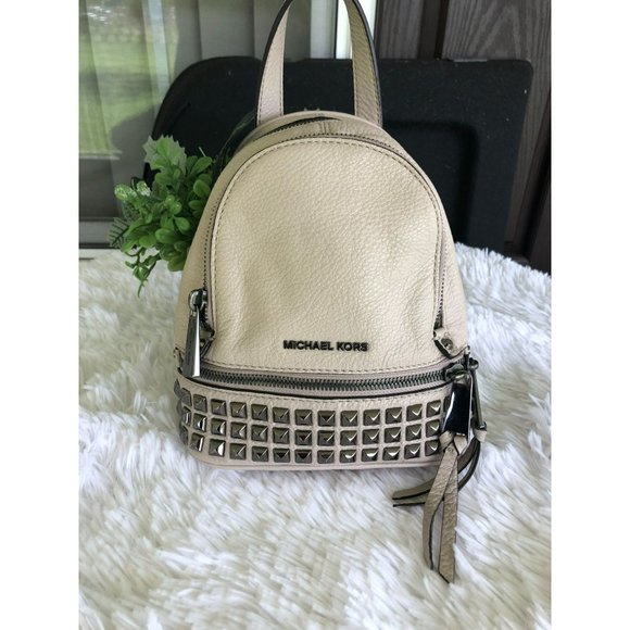 Michael Kors Handbags - Michael Kors Rhea Mini Backpack Studded